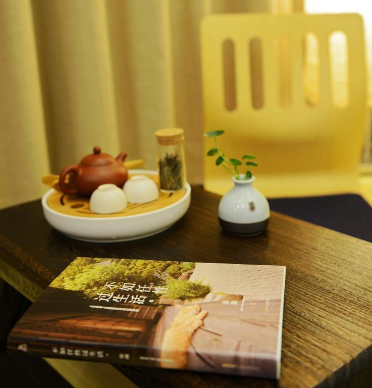 Hangzhou Puyu Travelling With Hotel Exteriör bild