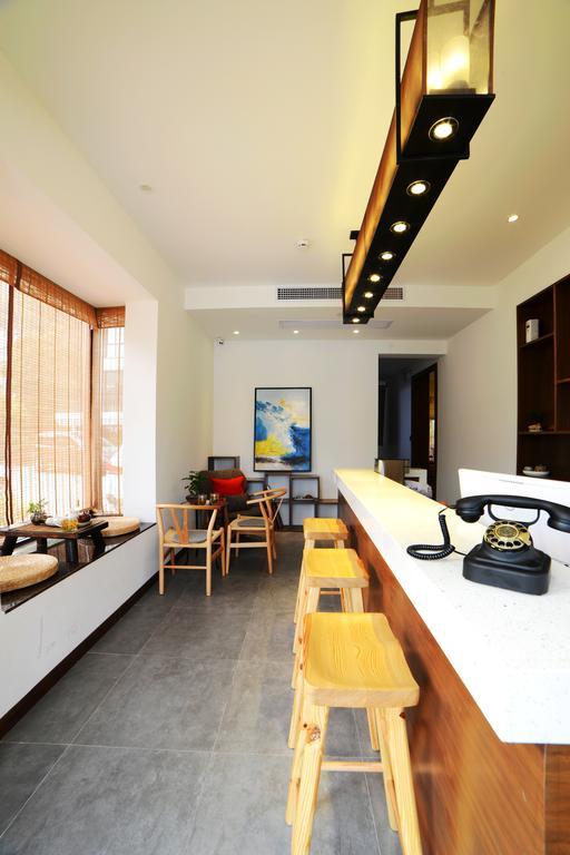 Hangzhou Puyu Travelling With Hotel Exteriör bild