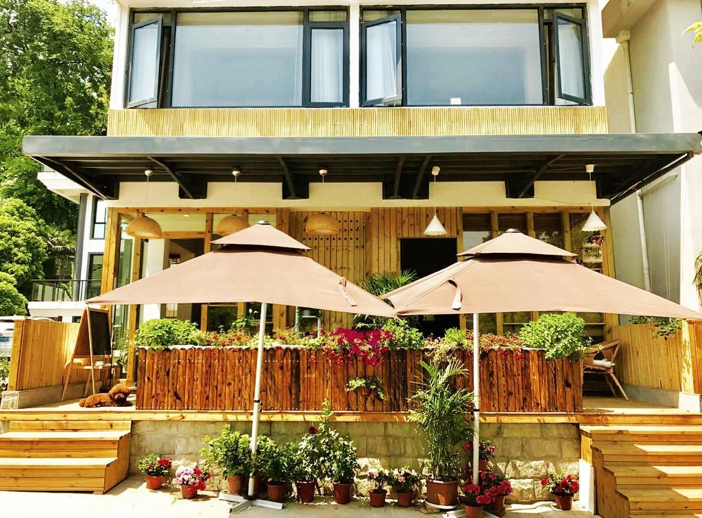 Hangzhou Puyu Travelling With Hotel Exteriör bild