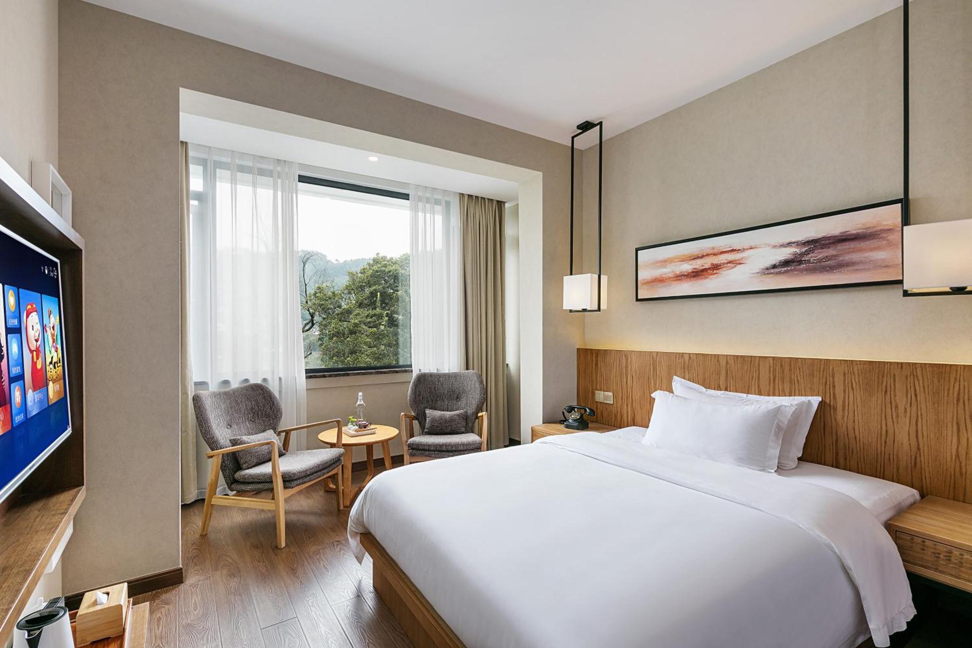 Hangzhou Puyu Travelling With Hotel Exteriör bild