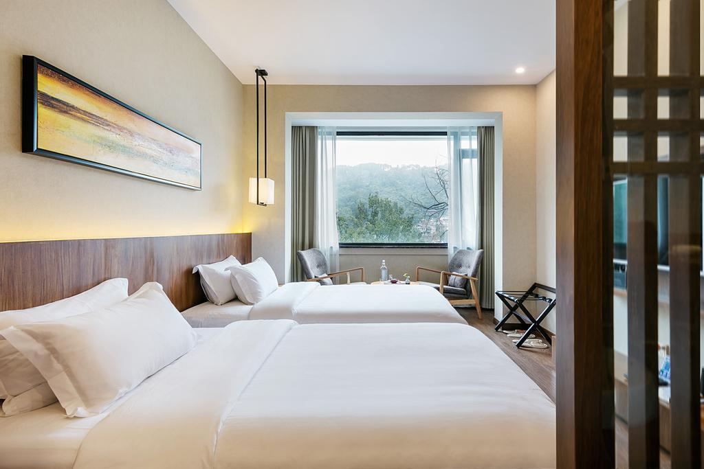 Hangzhou Puyu Travelling With Hotel Exteriör bild