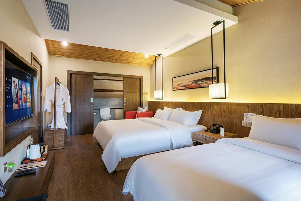Hangzhou Puyu Travelling With Hotel Exteriör bild
